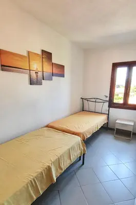 Letto o letti in una camera di ISS Travel, Le Carrube two bedrooms apartments with air conditioning