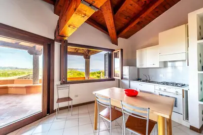 Cucina o angolo cottura di ISS Travel, Panoramic Coda Cavallo Cottages - 10 km from San Teodoro