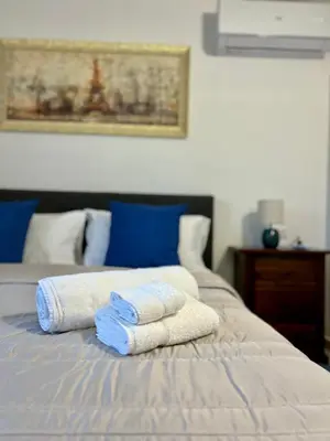 Letto o letti in una camera di Villa Grecale