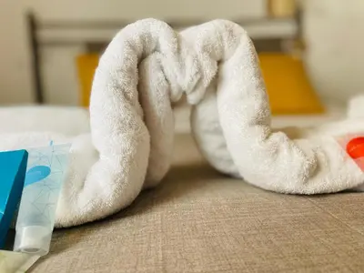 Letto o letti in una camera di Holmann Suite & Rooms