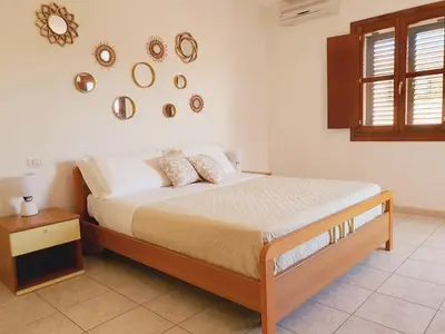 Letto o letti in una camera di La casa di Mara - Appartamento in zona residenziale a pochi minuti da Cala Liberotto