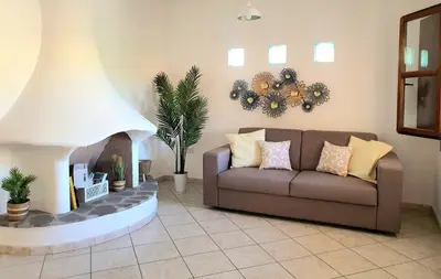 Area soggiorno di La casa di Mara - Appartamento in zona residenziale a pochi minuti da Cala Liberotto