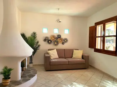 Area soggiorno di La casa di Mara - Appartamento in zona residenziale a pochi minuti da Cala Liberotto