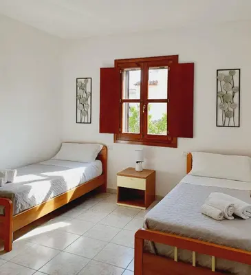 Letto o letti in una camera di La casa di Mara - Appartamento in zona residenziale a pochi minuti da Cala Liberotto