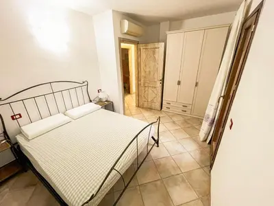 Letto o letti in una camera di Stella Marina 2