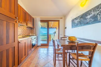 Cucina o angolo cottura di Rosa dei Venti by DomusAway
