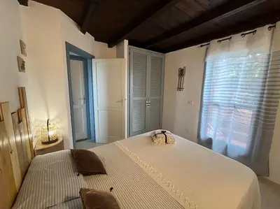 Letto o letti in una camera di Villetta con vista mozzafiato