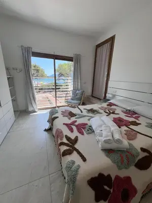 Letto o letti in una camera di THE BEACH