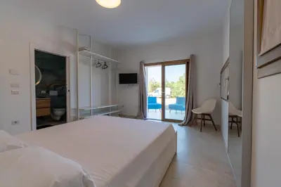 Letto o letti in una camera di THE BEACH