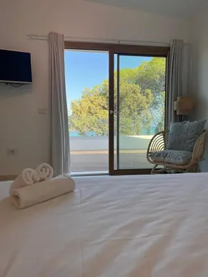 Letto o letti in una camera di THE BEACH