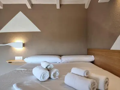 Letto o letti in una camera di Lu Canaleddu Room