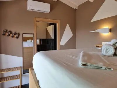 Letto o letti in una camera di Lu Canaleddu Room