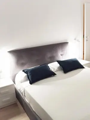 Letto o letti in una camera di Le pergole