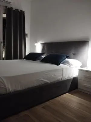Letto o letti in una camera di Le pergole