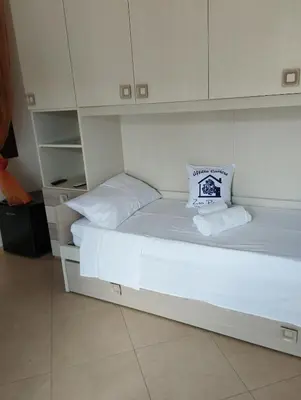 Letto o letti in una camera di Affitta Camere Zio Peppe