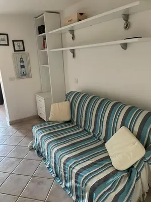 Letto o letti in una camera di Monolocale Cala Reale