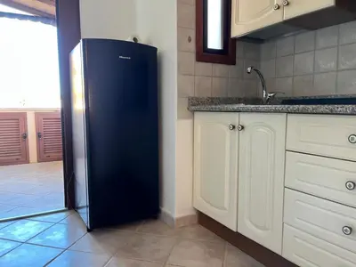 Cucina o angolo cottura di Monolocale Cala Reale