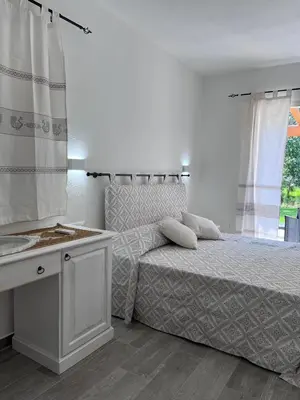 Letto o letti in una camera di Sa Jacca Albergo Rurale