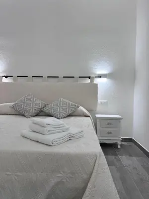 Letto o letti in una camera di Sa Jacca Albergo Rurale