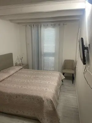 Letto o letti in una camera di La perla del mare 2