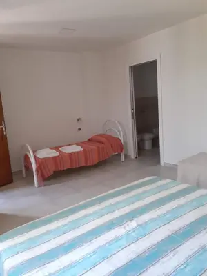 Letto o letti in una camera di Barrumbas