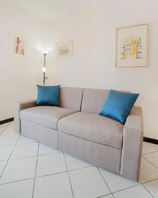 Area soggiorno di AMBRA Holiday Rooms