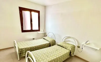 Letto o letti in una camera di ISS Travel, Gli Asfodeli - Large apartments with private terrace