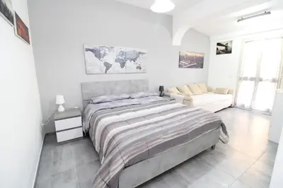 Letto o letti in una camera di Summer Room- Fronte Spiaggia