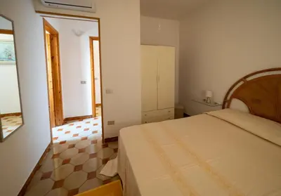 Letto o letti in una camera di B&B Da Laura San Teodoro