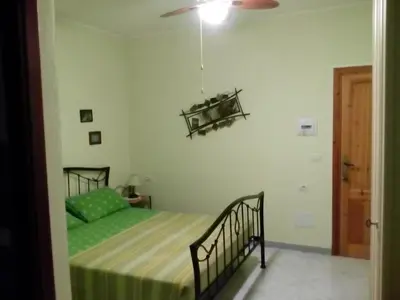Letto o letti in una camera di Su Sole