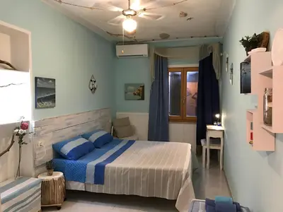 Letto o letti in una camera di Su Sole