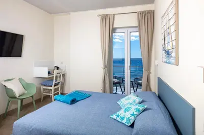 Letto o letti in una camera di La casa del pescatore