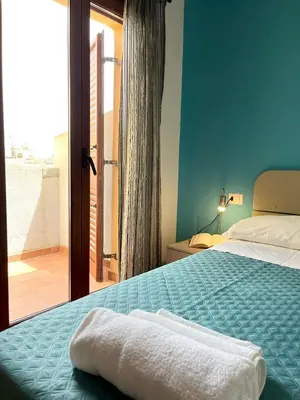 Letto o letti in una camera di Casa Mare e Sole IUN R2610