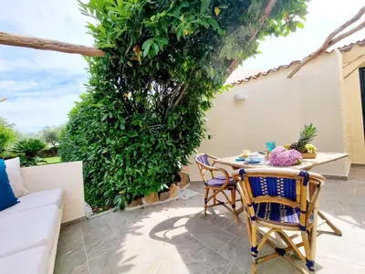 Balcone o terrazza di STAZZO SAN TEODORO IL GINEPRO Piscina Condivisa