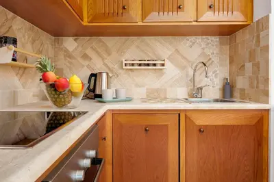 Cucina o angolo cottura di Appartamento Eleganza - SHERDENIA Luxury Apartments