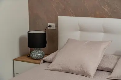 Letto o letti in una camera di Rooms Tavolara