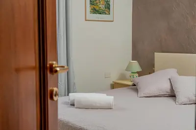 Letto o letti in una camera di Rooms Tavolara