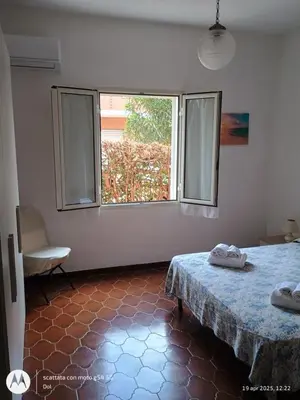 Letto o letti in una camera di La Terrazza Di Chiara