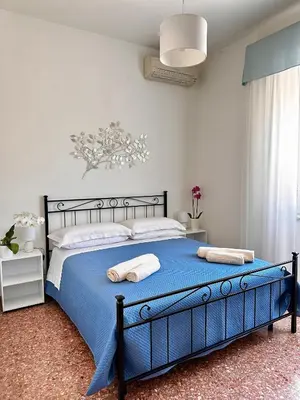 Letto o letti in una camera di B&B Casa Morgana
