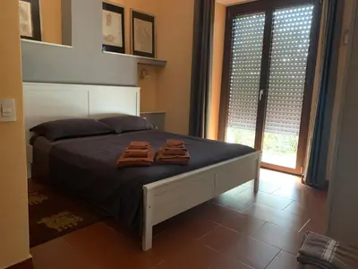 Letto o letti in una camera di Casa Cervo