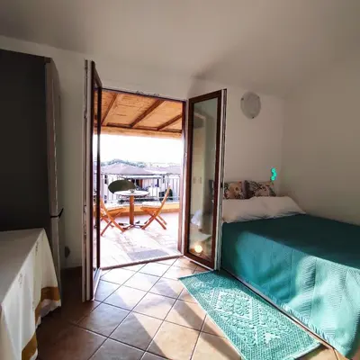 Letto o letti in una camera di Vista Mare Olbia