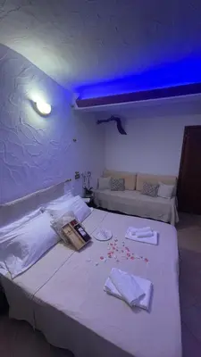 Letto o letti in una camera di Matta e Sole