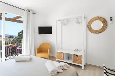 Letto o letti in una camera di Sardegna è - New Rooms