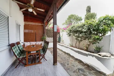 Balcone o terrazza di Sardinian Cottage, 150m from the sea, private Garden