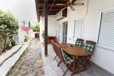 Balcone o terrazza di Sardinian Cottage, 150m from the sea, private Garden