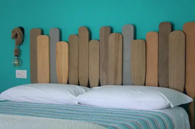 Letto o letti in una camera di LIDO DEL FARO