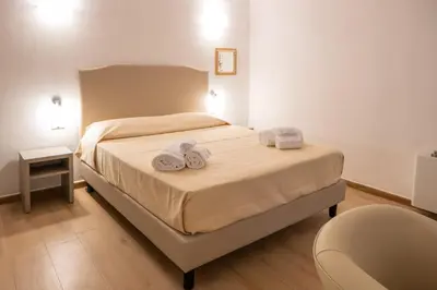 Letto o letti in una camera di NONNU NONNA