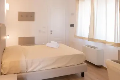 Letto o letti in una camera di NONNU NONNA