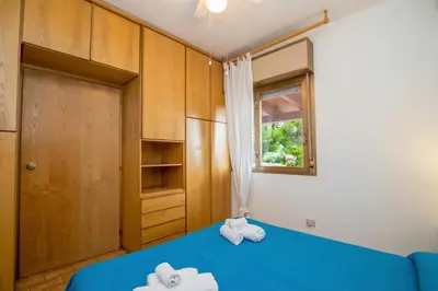 Letto o letti in una camera di Blue Pearl With Sea View - Happy Rentals