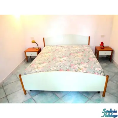 Letto o letti in una camera di LA CINTA